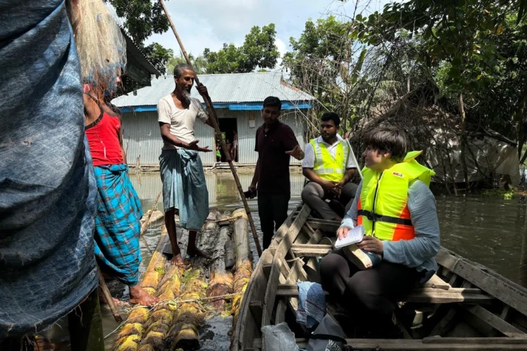 International film crew working with local fixer coordinator in Bangladesh for documentary production