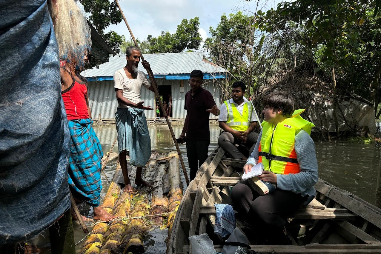 International film crew working with local fixer coordinator in Bangladesh for documentary production