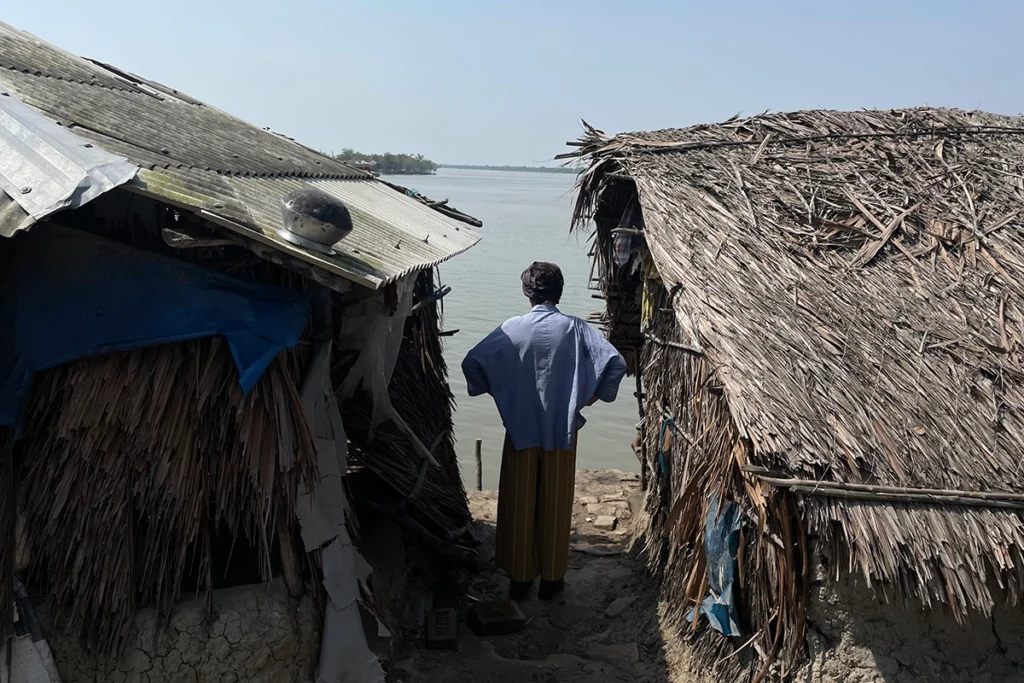 Climate-affected coastal village in Bangladesh requiring local fixer for media access and interview coordination